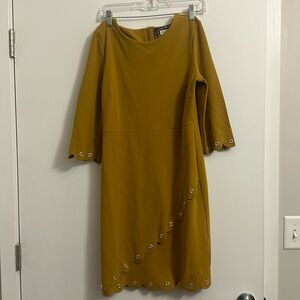 Women’s professional dress in mustard